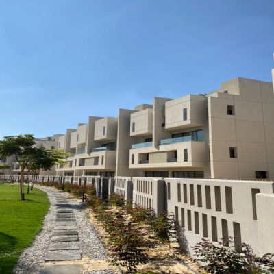 Townhouse overlooking landscape in burouj compound